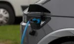 66d583b4bd6d7a51420e8be6_A-representational-image-of-a-EV-being-charged