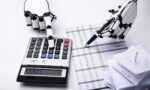 Robot Examining Financial Report With Calculator