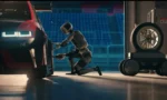 Humanoid-robot-working-on-a-car