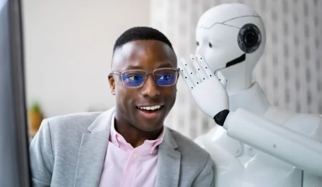 ai-robot-whispering-to-man-1371325601-1774x1110-c-center