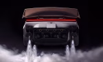 https___hypebeast.com_image_2026_10_15_tesla-roadster-unveils-second-gen-flying-car-spacex-thrusters-revealed-000